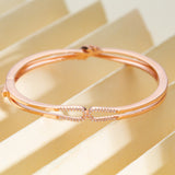 Rose-Gold Double Chain Infinity Bracelet.
