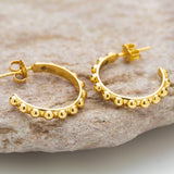 Golden Hoop Earrings.